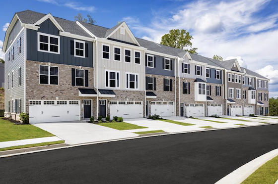 Image of New Townhomes in Sugar Hill, Georgia built by Ryan Homes in the New Home Community of Park Ridge at Sugar Hill!